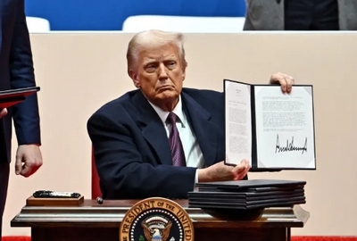 What is an executive order, and what orders did Trump sign on day 1?